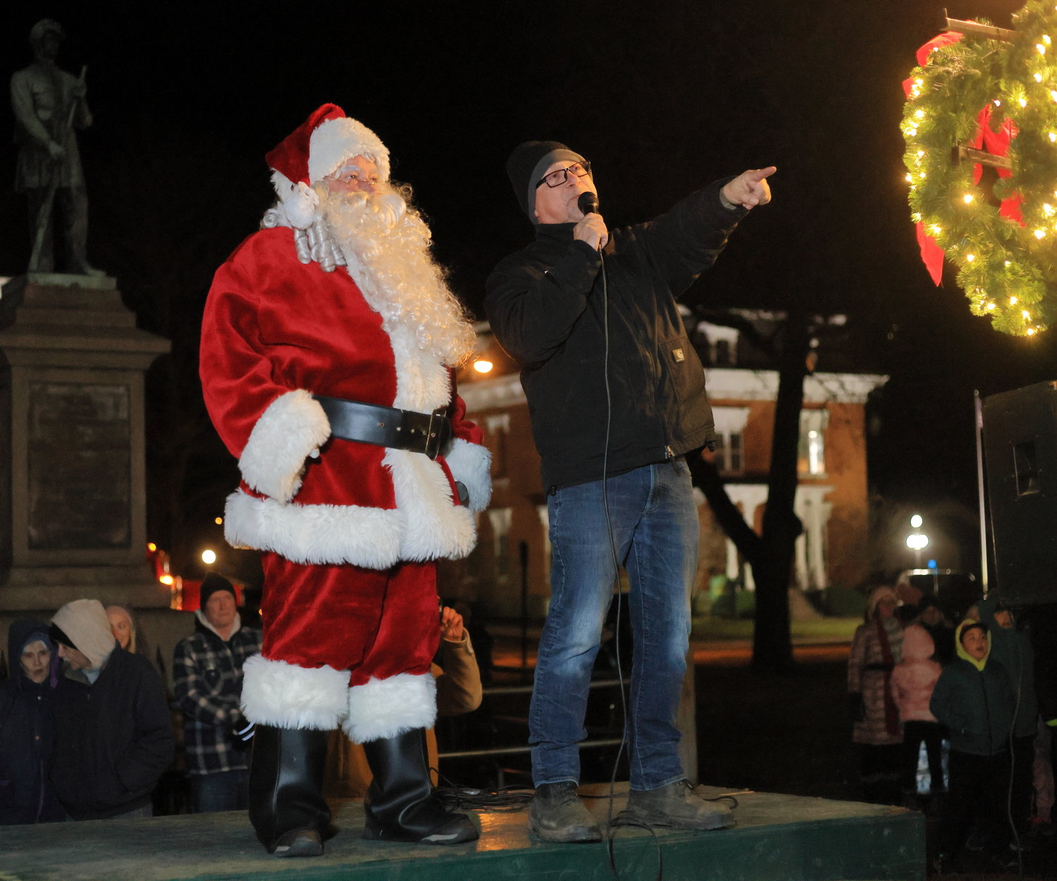 Santa and “Classic” George Schmitt of Bold Gold Radio are counting down with the crowd. Next they’ll hit the switch, turning the tree lights on in Honesdale’s Central Park, as well as on the large star on Irving Cliff that overlooking the borough.  ..